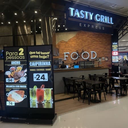 Logo da loja tasty grill